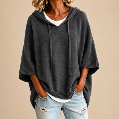 Oriana | Poncho in maglia con cappuccio e manica a tre quarti da donna