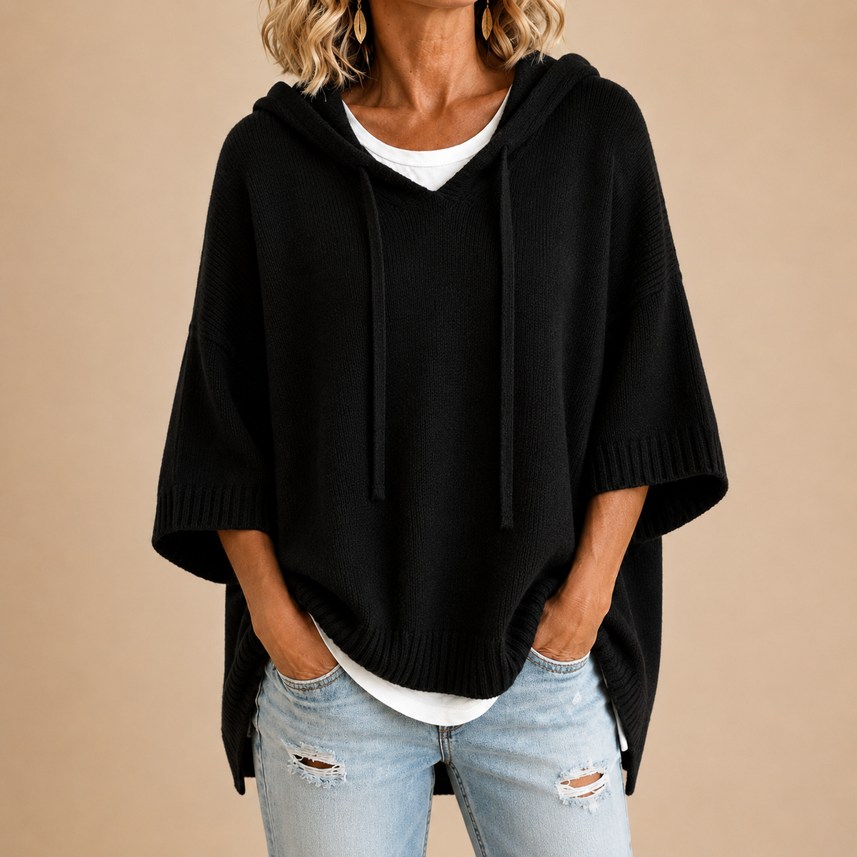 Oriana | Poncho in maglia con cappuccio e manica a tre quarti da donna