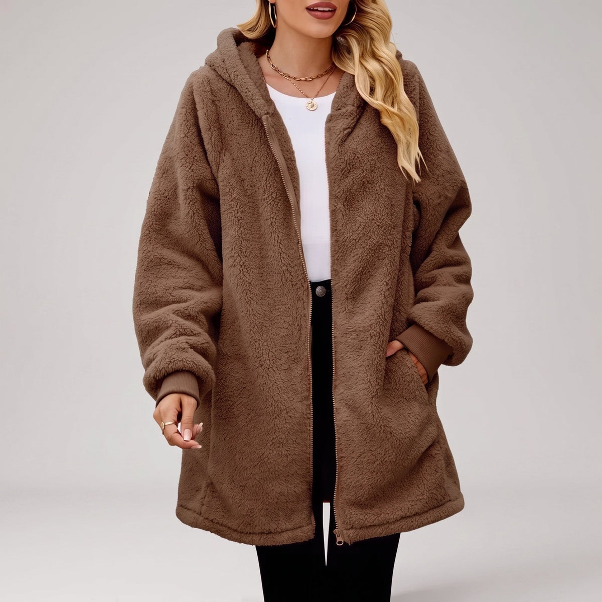 Oriana | Giacca sherpa con cappuccio e zip per donna