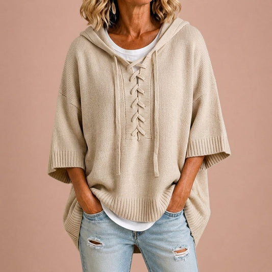 Claudia | Poncho in maglia con cappuccio per donna