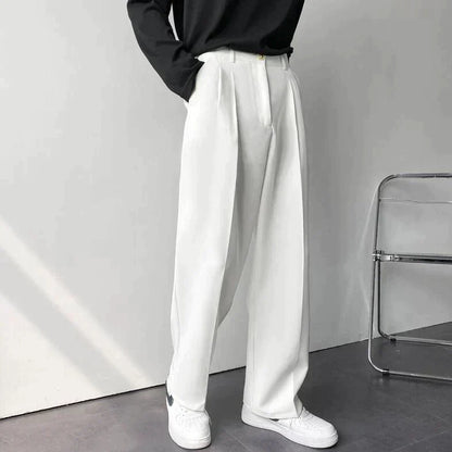 Italo | Pantaloni a gamba larga con pinces e vita alta da uomo