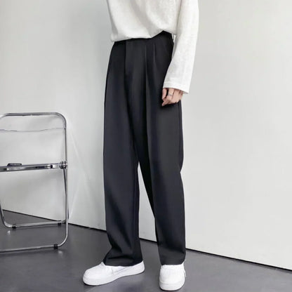 Italo | Pantaloni a gamba larga con pinces e vita alta da uomo