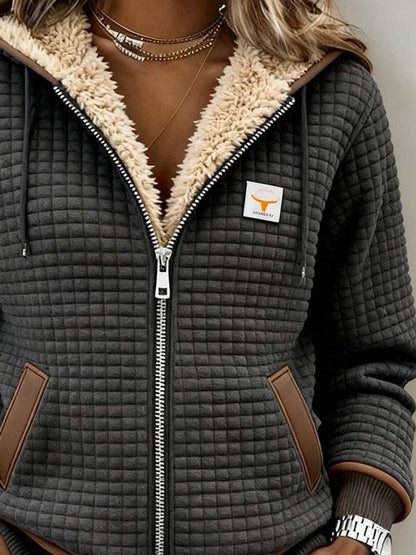 Sandra | Giacca trapuntata con cappuccio e interno sherpa da donna